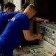 3 Auszubildende von Kocher Elektrotechnik in Lehrwerkstatt Dortmund vor Schulbeginn